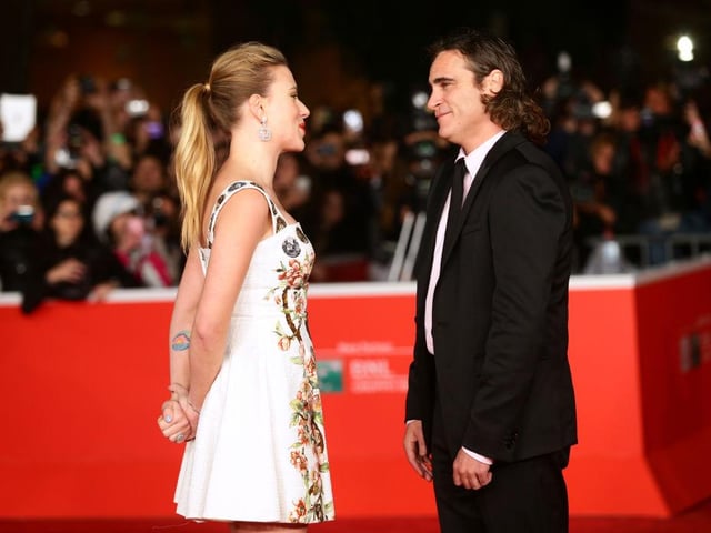 Joaquin Phoenix and Scarlett Johansson star in the alternative romance film Her. Set in a futuristic universe, it follows Theodore (Phoenix) as he falls in love with a computerised women, or more blunty put - an operating system played by Johansson.