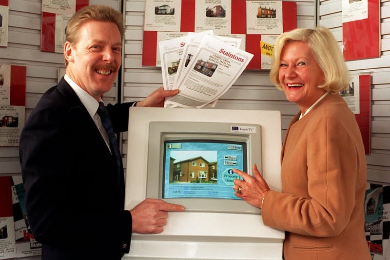 A new Touch TV for buying houses was unveiled at Staintons estate agents on Beeston Road in April 1996. Pictured, from left is David Pank showing customer June Broughall how to use the system.