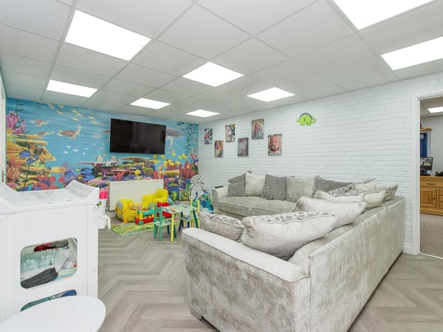 This large room is ideal as a cinema rooom, play room, or alternative.