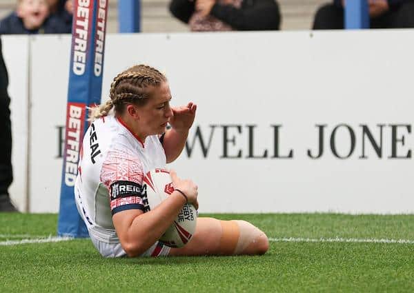 Rhinos' Caitlin Beevers scores for England in their mid-season win over France. Picture by Paul Currie/SWpix.com.