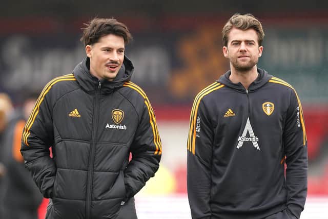 Leeds United's Patrick Bamford (right) and Robin Koch inspect the pitch before the Emirates FA Cup fourth round match at the Wham Stadium, Accrington. Picture date: Saturday January 28, 2023.
