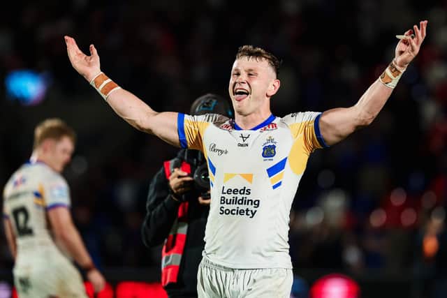 Harry Newman celebrates Leeds Rhinos' remarkablke comeback win at Wakefield Trinity two weeks ago. They'll need more of that sort of form to hang on to top spot. Picture by Alex Whitehead/SWpix.com.