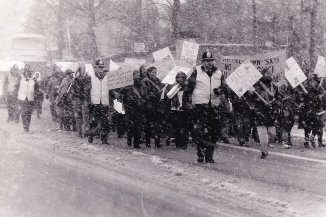 Around 80 people marched in driving snow on a Saturday in December 1988 to protest at increased police presence and alleged harassment in the community. The march was organised by some residents in the community angry about a police initiative which had doubled the number of officers on the beat. Their action drew an immediate response from a police chief who claimed only a quarter of the 400 names on a petition were genuine and that the initiative was supported by the majority of residents.