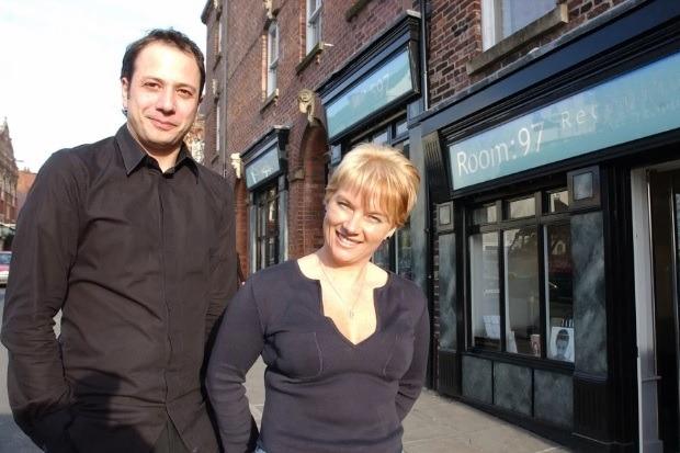 Marcello Mocia & Claire Brown outside Room 97 hairdressers, Westgate, Wakefield. The building won a Civic Society Award in 2004.