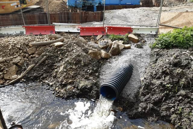 As part of the Leeds Flood Alleviation Scheme Phase 2 a pipe has been built so that water from the River Wharfe can be pumped towards the goit. However, residents say that the gates still need to be opened so that it can be effective. Photo: National World