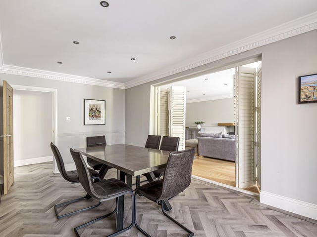 There is also an open plan dining room with internal bi-fold doors.