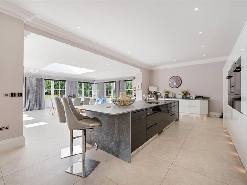 At the heart of the home is a stunning open-plan family space.