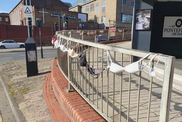 Pontefract and District Breast Cancer Support Group members hung around 1,500 bras on railings and in shop windows in and around the town centre at the start of October.
