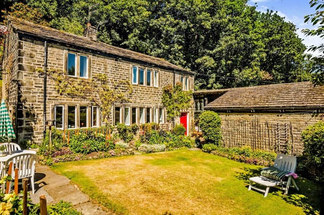 Swamp Cottage, Ellen Holme Lane, Luddendenfoot, Halifax, is for sale priced £650,000.