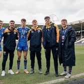 Leeds Rhinos' Riley Lumb, third from left, with his player of the match award from his two-try debut at Hull, alongside fellow acadmy products Alfie Edgell, Jack Sinfield, Ned McCormack, Ben Littlewood and Tom Nicholson-Watton who were all in the 21-man squad. Picture by Alex Whitehead/SWpix.com