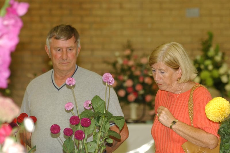 Joan and Ray Bardwell from Marsden were browsing round the produce in this 2005 photo but who can tell us which show it was?