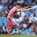 RISING STARS: Leeds United's Charlie Crew goes after Manchester City's Justin Oboavwodou in Friday night's FA Youth Cup final at the Etihad. Photo by Charlotte Tattersall/Getty Images.