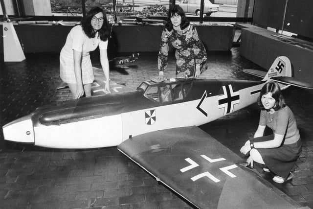 Your Yorkshire Evening Post hosted 'The History of Aviation in Model Form 'in the newspaper's public space at its Wellington Street headquarters in July 1972. Pictured are YEP employees Jenny Dolby, Margaret Keen and Kay Downing examining a half scale model of a German Me. 109E fighter aircraft.