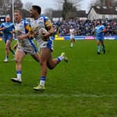 Derrell Olpherts scores for Leeds Rhinos in their pre-season win over his new club Wakefield Trinity. Picture by Steve Riding.