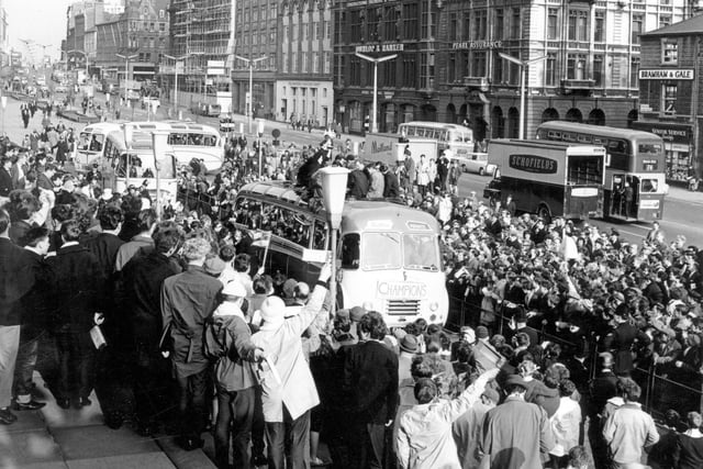 The Leeds United team arrive at the Town Hall for a civic reception in May 1964. This was to celebrate the club winning the second Division Championship Cup and the West Riding Senior Cup, the first major trophies the team had won for forty years. Thousands of supporters gathered to watch their arrival.