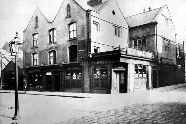 The Old Hall Hotel pictured circa 1893. Above the central first floor window is a plaque which reads "rebuilt 1867" along with some illegible initials, possibly an "O.".