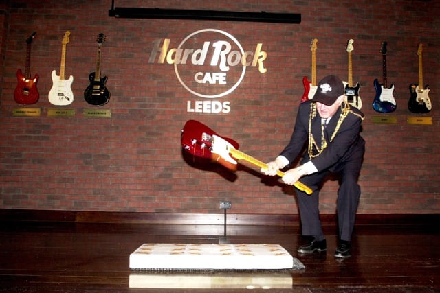 The Lord Mayor of Leeds, Bryan North, officially opened the Cafe in December 2002 by smashing a guitar.