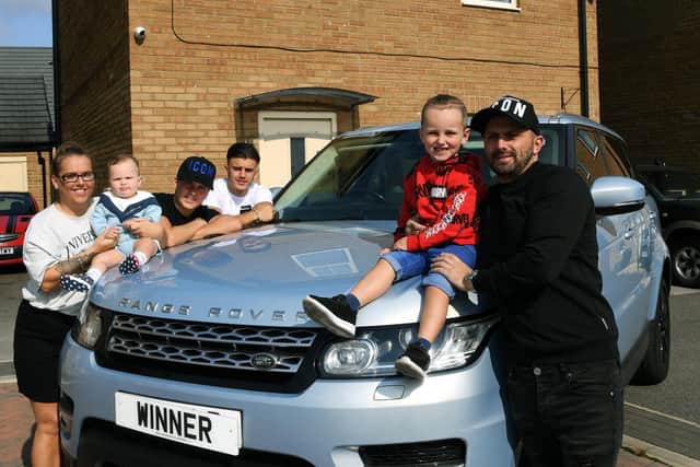 The winnings also include the family’s seven-seater Range Rover Sport and Kawasaki Ninja Superbike. Picture: Jonathan Gawthorpe