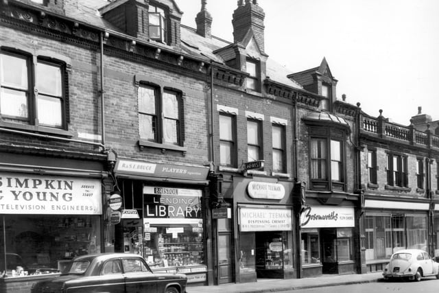 From left in June 1965, is Simpkin and Young, radio and television engineers. Then R & S.E. Bruce's confectioners and tobacconists. Jars of sweets line the shop windows. This shop was also a private lending library where members paid a small sum of money per week to borrow from a selection of books. Next, follows a chemists, business of Michael Teeman. Bosomworth's Furnishers was at number 180. At this time there was another Bosomworth's at number 198 Kirkstall Road. On the dormer windows of numbers 182 & 180 is the date 1893. On the right edge is part of the Leeds Industrial Co-operative Society Ltd, at number 178. This particular unit is vacant.