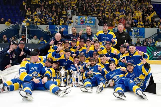 NICE KNIGHT FOR IT: Leeds Knights' players celebrate with the NIHL National play-off trophy after their 5-4 win over Raiders IHC in Coventry. Picture: Chris Callaghan/Blueline.
