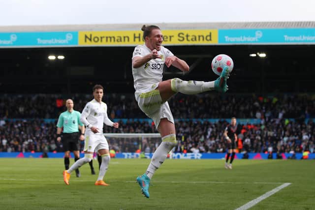 LEEDS, ENGLAND - APRIL 02: Luke Ayling of Leeds United clears the ball during the Premier League match between Leeds United and Southampton at Elland Road on April 02, 2022 in Leeds, England. (Photo by Marc Atkins/Getty Images)