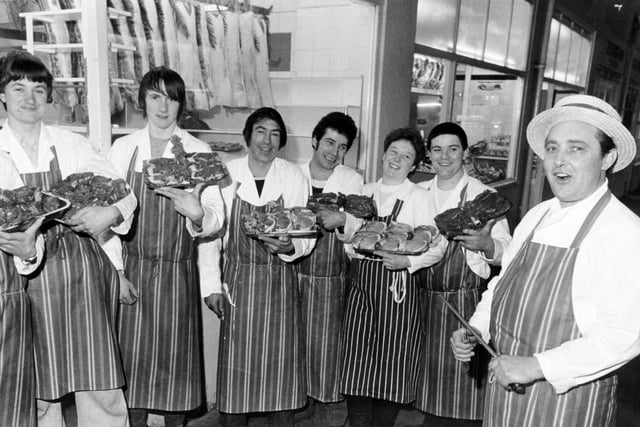 Storms brought an unexpected bonanza to shoppers in Kirkgate Market in February 1983.  More that 800 customers got the bargain of a lifetime when butcher Trevor Middleton, thinking his shops might be closed because of the damage to Leeds market, cut his prices "to the Bone" and gave away vegetables with the meat. Pictured is Trevor Middleton (right) of Middleton Hargreaves butchers, with some of his staff who helped sell the meat, from left, Brian Longbottom, Christopher Farmer, Roy Marsden, Colin Clark, Jackie Morgan and Graham Wray.