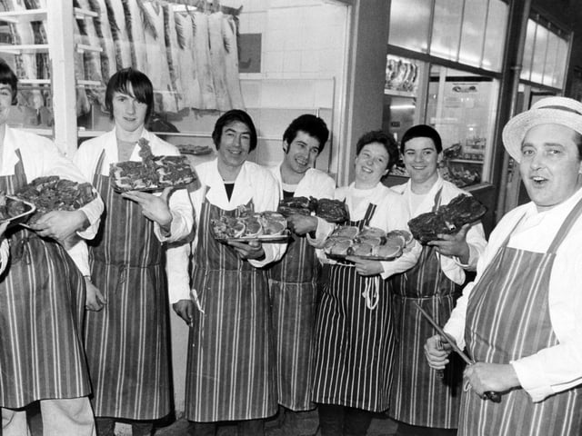 Storms brought an unexpected bonanza to shoppers in Kirkgate Market in February 1983. More that 800 customers got the bargain of a lifetime when butcher Trevor Middleton, thinking his shops might be closed because of the damage to Leeds market, cut his prices "to the Bone" and gave away vegetables with the meat. Pictured is Trevor Middleton (right) of Middleton Hargreaves butchers, with some of his staff who helped sell the meat, from left, Brian Longbottom, Christopher Farmer, Roy Marsden, Colin Clark, Jackie Morgan and Graham Wray.
