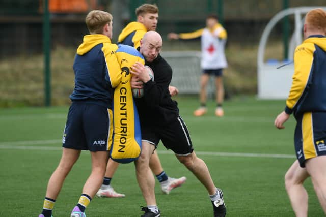Former Wakefield winger Lee Kershaw (in black top) training with Rhinos on Tuesday. Picture by Jonathan Gawthorpe.