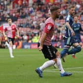 DIFFERENT NARRATIVE: As Adam Armstrong, above, fires Southampton in front after just two minutes of Saturday's Championship clash at St Mary's with Liam Cooper looking on in the background. Photo by George Tewkesbury/PA Wire.