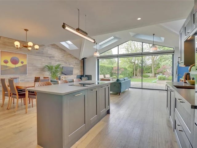 A fabulous family space at the rear of the house with dual aspect windows, the living/dining kitchen has Velux skylights and sliding patio doors out to the garden. It boasts a feature glazed top light above the doors and beautiful oak panelling to one wall.