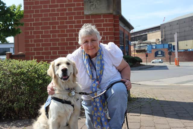 Fiona Burton with trainee support dog Oliver
