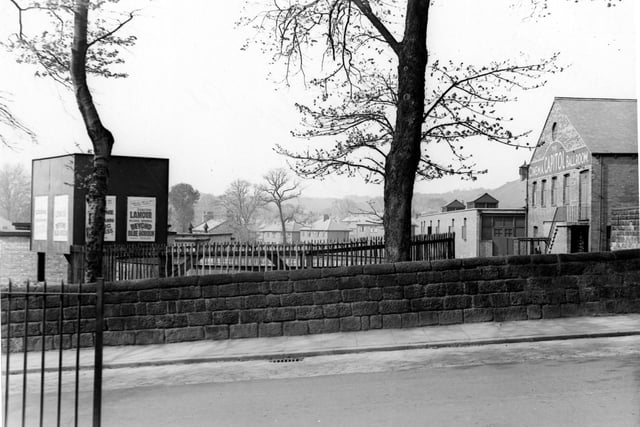 A static water supply tank on Monk Bridge Road, behind the Capital Cinema & Ballroom. This can be seen on the right of the photo. To the left is a notice board advertising Dorothy Lamour in Beyond The Blue Horizon. Pictured in April 1943.