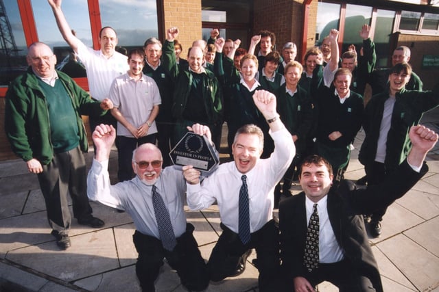 Employees at Yorkshire Electricity's meter station at Seacroft, Leeds, celebrate gaining their Investors in People Award.