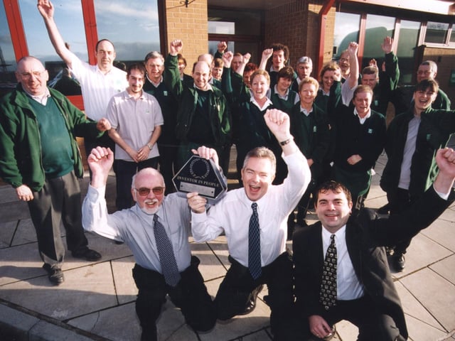 Employees at Yorkshire Electricity's meter station at Seacroft, Leeds, celebrate gaining their Investors in People Award.