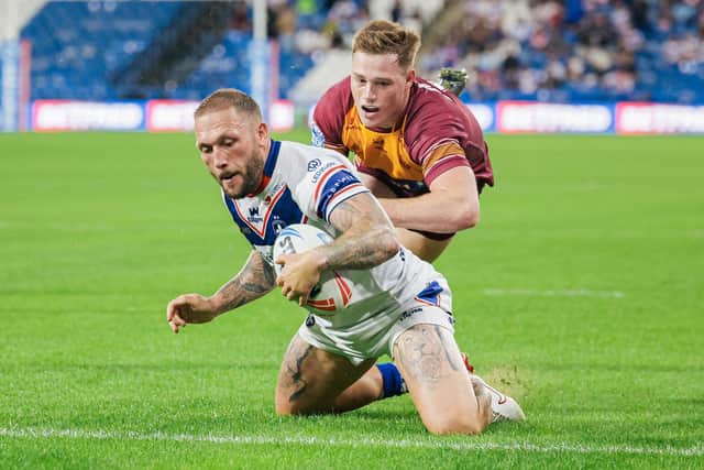 Josh Griffin scores for Wakefield Trinity in their win at Huddersfield Giants on July 18. Picture by Alex Whitehead/SWpix.com.