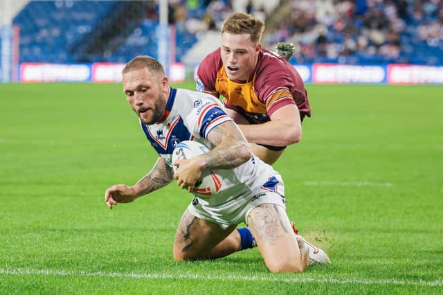Josh Griffin scores for Wakefield Trinity in their win at Huddersfield Giants on July 18. Picture by Alex Whitehead/SWpix.com.