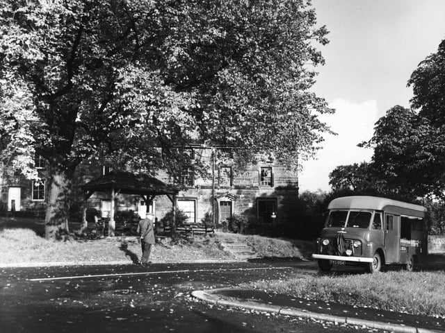 A milk van makes its way through Ackworth near Pontefract in October 1960.