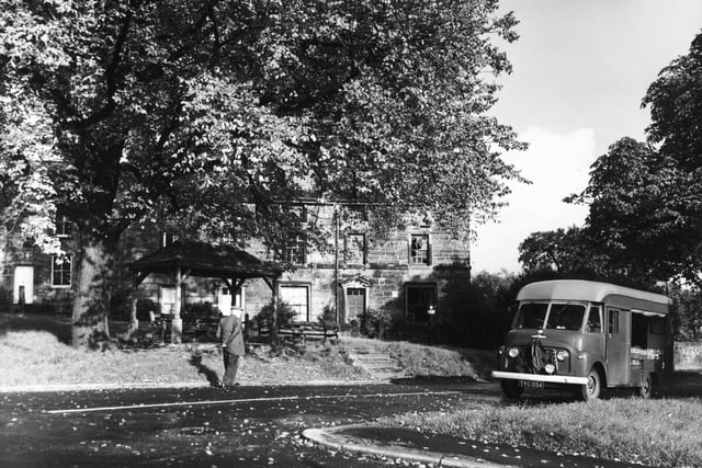 A milk van makes its way through Ackworth near Pontefract in October 1960.