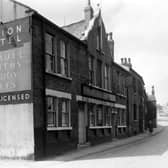 The Albion Hotel, a Samuel Smith's public house, on Buslingthorpe Lane in July 1958. The view looks towards the Sheepscar Street/Scott Hall Road junction.