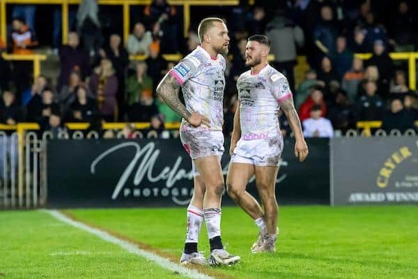 James Bentley, pictured right with Blake Austin, will return for Rhinos at Hull KR after a one-game ban. Picture by Allan McKenzie/SWpix.com.