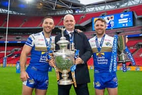 Richie Myler, right, with the Lance Todd Trophy after Leeds' 2020 Wembley win over Salford Red Devils. Also pictured are captain Luke Gale and coach Richard Agar, with the Challenge Cup. Picture by Allan McKenzie/SWpix.com