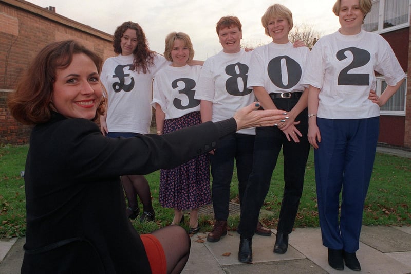 Emma Wright, co-odinator for Make A Wish Foundation, displays the money raised by Halifax Building Society staff in Garforth in December 1998. Pictured, from left, are Jill Howard, Mandy Carpenter, Leanne Hosty, Caroline Ellis and Sarah Berman.