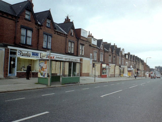 Harehills Lane showing a parade of shops between Berkeley Road and Strathmore Drive.