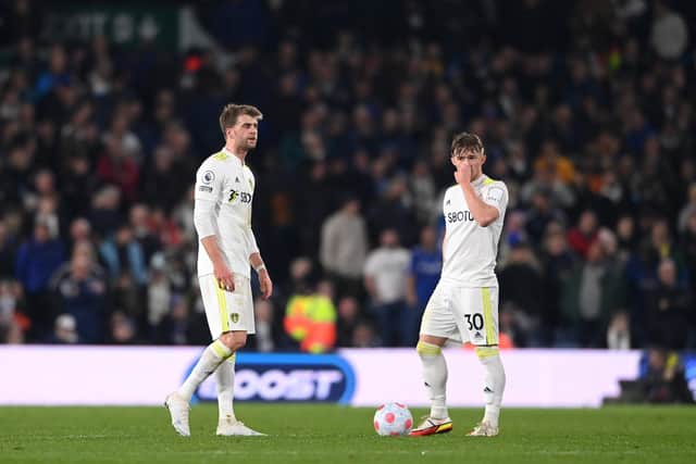 LEEDS, ENGLAND - MARCH 10: Patrick Bamford and Joe Gelhardt of Leeds United react after Aston Villa scored their third goal during the Premier League match between Leeds United and Aston Villa at Elland Road on March 10, 2022 in Leeds, England. (Photo by Stu Forster/Getty Images)