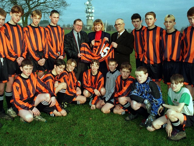 Tinshill Tigers in their new strip provided by local councillors in January 1997 . Pictured centre, left, is Cookridge councillor Alan Proctor with Gaynor Waite, Tigers secretary and Joe Thoms, chairman of Tinshill Concern.