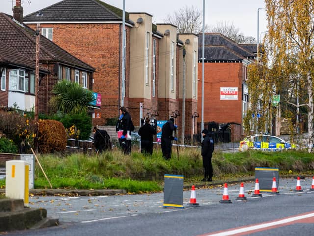 Police investigate the fatal crash on Stanningley Road, Leeds, near to the junction with Armley Ridge Road (Photo by James Hardisty/National World)