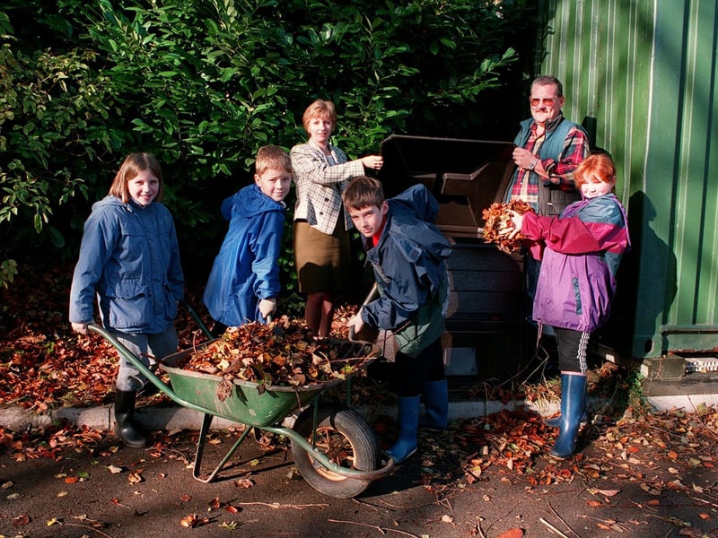 Leaves being loaded into compost bin at Roundhay St John's School in November 1996. Pictured, from left, are Vicky Firth, Alex Woodhead, coordinator Carol Austin-Sales, Christopher Baum, caretaker Paul Spence and Amy Howard.