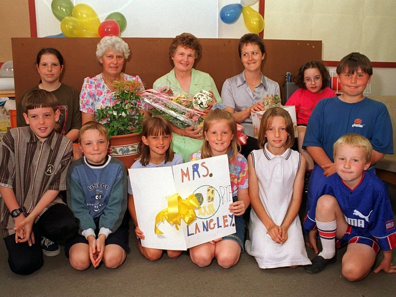 Pupils and staff West Garforth Junior School said farewell to Dorothy Langley (pictured with flowers)in July 1996 who was retiring from the kitchens after 20 years.