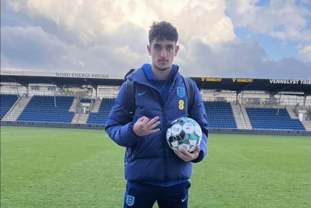 Sonny Perkins poses with the matchball after England Under-19s' 6-0 win over Georgia