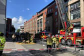 The fire, said to be between King Street and Northern Street, broke out in a building this afternoon.